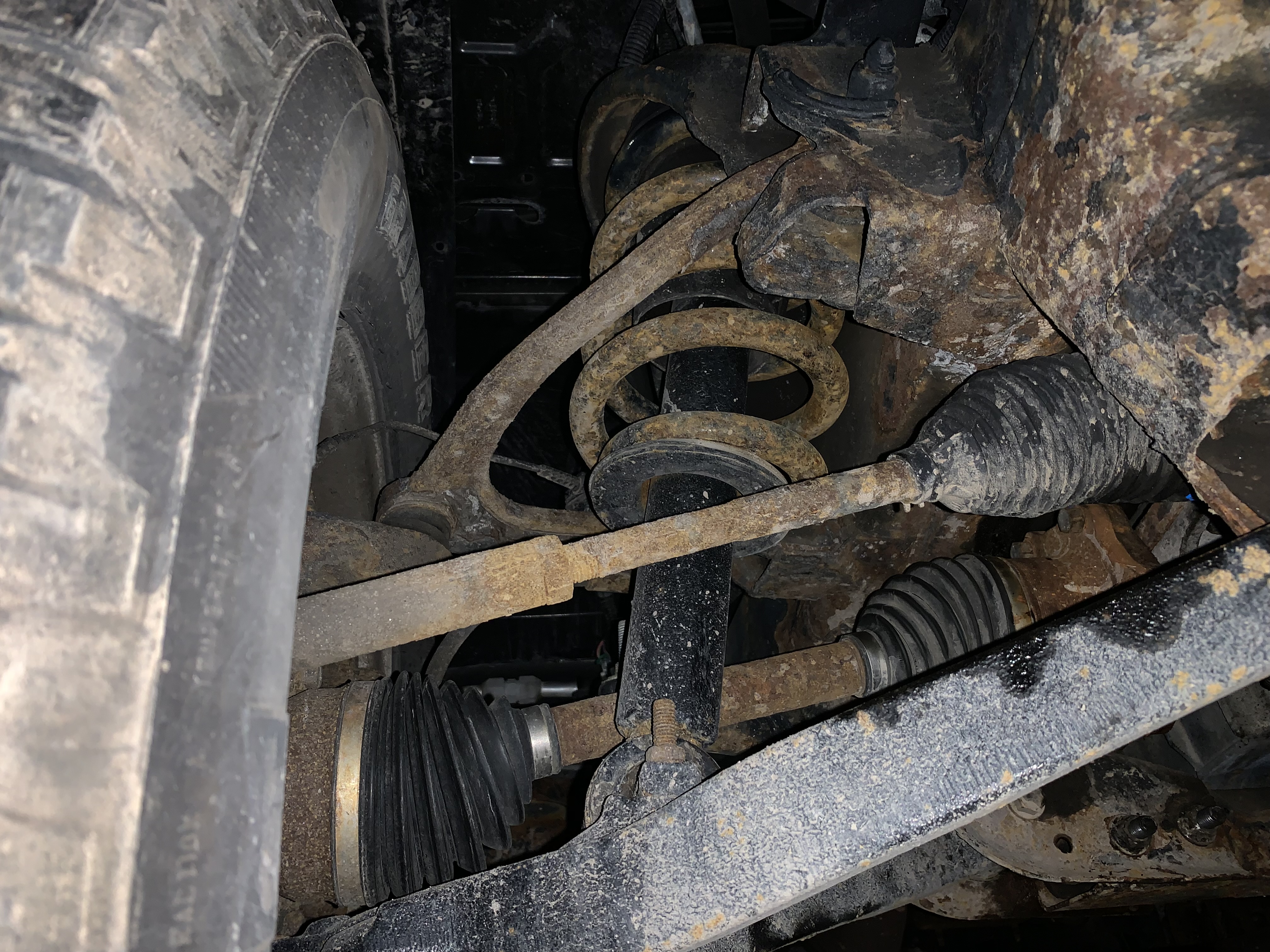 Rusty Strut Under Vehicle | Lou's Car Care Center, Inc.